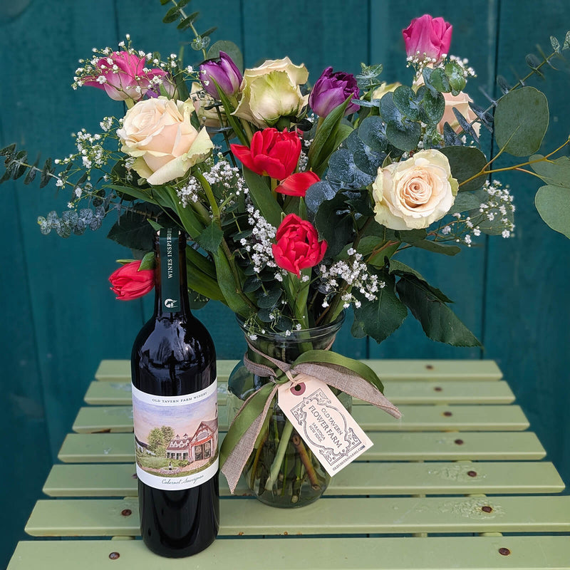 Valentine's Day flower bouquet and bottle of red wine from Old Tavern Flower Farm