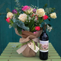 Valentine's Day flower bouquet and bottle of red wine from Old Tavern Flower Farm
