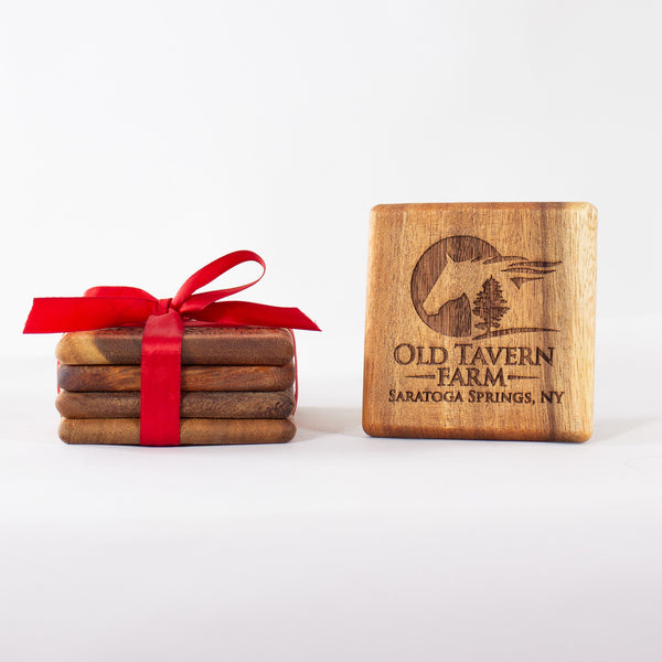 Set of four wooden coasters with Old Tavern Farm logo